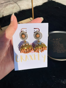 Jhumka Gold and Skin